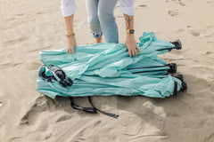 Pop 'N Go Canopy in blue providing shade for outdoor activities and UV protection.