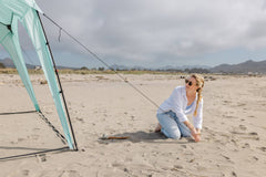 Pop 'N Go Canopy in blue providing shade for outdoor activities and UV protection.