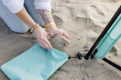 Pop 'N Go Canopy in blue providing shade for outdoor activities and UV protection.