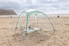 Pop 'N Go Canopy in blue providing shade for outdoor activities and UV protection.
