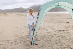 Pop 'N Go Canopy in blue providing shade for outdoor activities and UV protection.