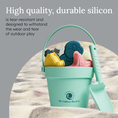 Sea Creatures Beach Toy Set in a mint green bucket with colorful ocean-themed toys and a shovel for fun sand play.