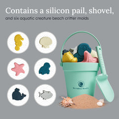 Sea Creatures Beach Toy Set in a mint green bucket with colorful ocean-themed toys and a shovel for fun sand play.