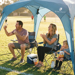Family enjoying a picnic under the Pop 'N Go Canopy, showcasing outdoor shade and comfort.