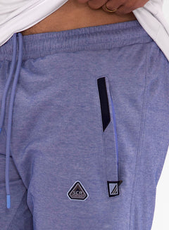 Model wearing Urban Stride All-Day Wear Shorts from behind, showcasing tall fit, comfort, and modern streetwear style.