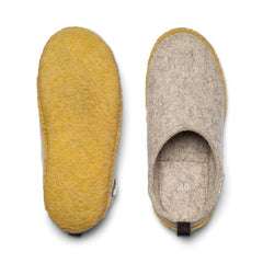 Kyrgies Outdoor Wool Slides in a beige color with a flexible design, perfect for indoor and outdoor comfort.