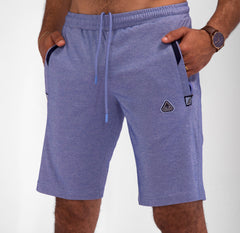 Model wearing Urban Stride All-Day Wear Shorts from behind, showcasing tall fit, comfort, and modern streetwear style.