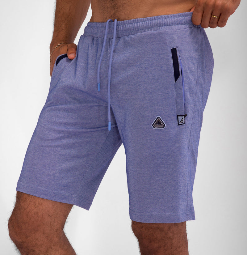 Model wearing Urban Stride All-Day Wear Shorts from behind, showcasing tall fit, comfort, and modern streetwear style.